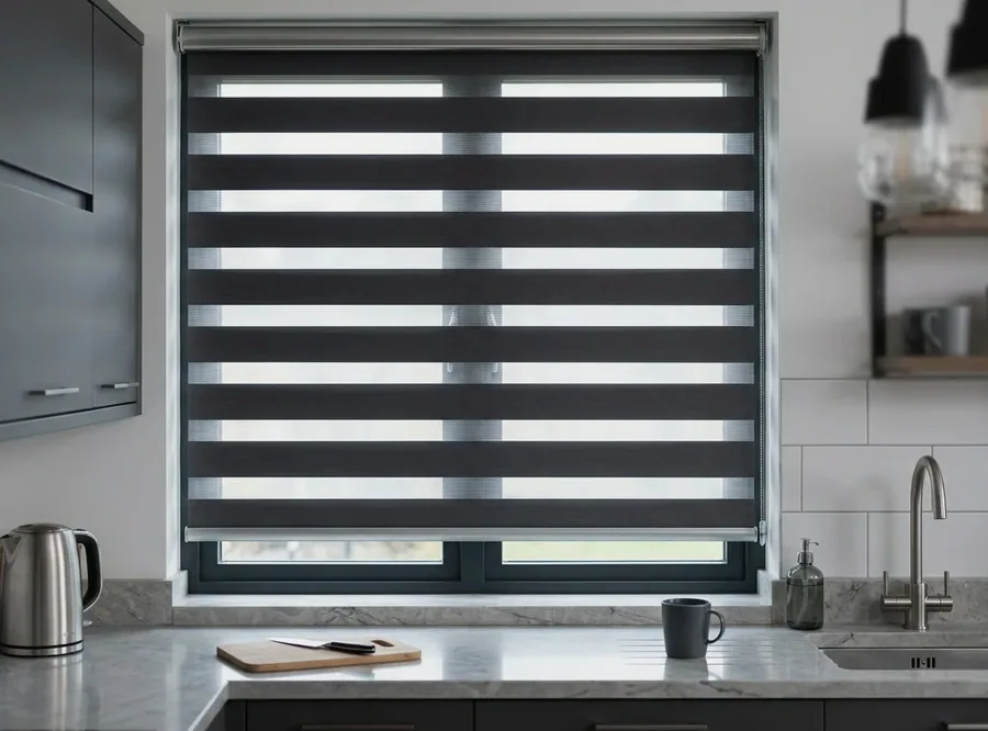 Day and night blind with alternating sheer and solid bands over a kitchen window